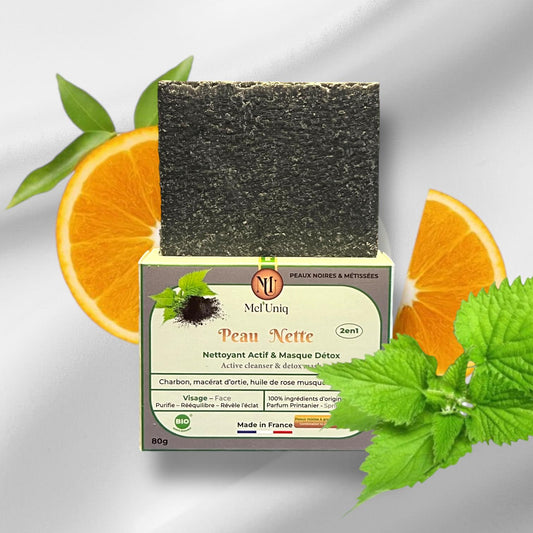 savon actif & masque Detox Peau Nette décoré un quartier d'orange et une feuille d'ortie