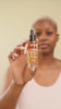Texture et application du sérum bi-phase éclat Mel’Uniq anti-taches
